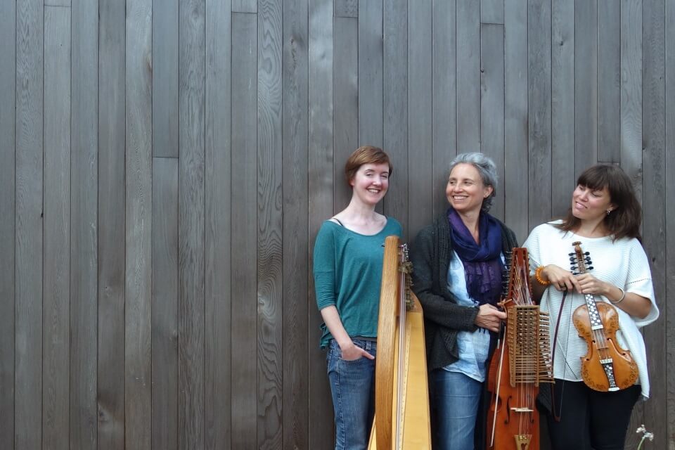 Portrait of group in front of wall